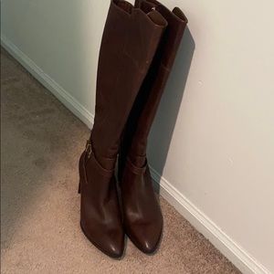 Brand new brown leather boots.
